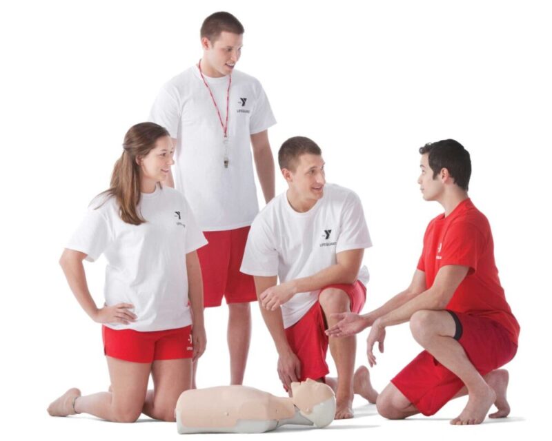 3 students being taught CPR