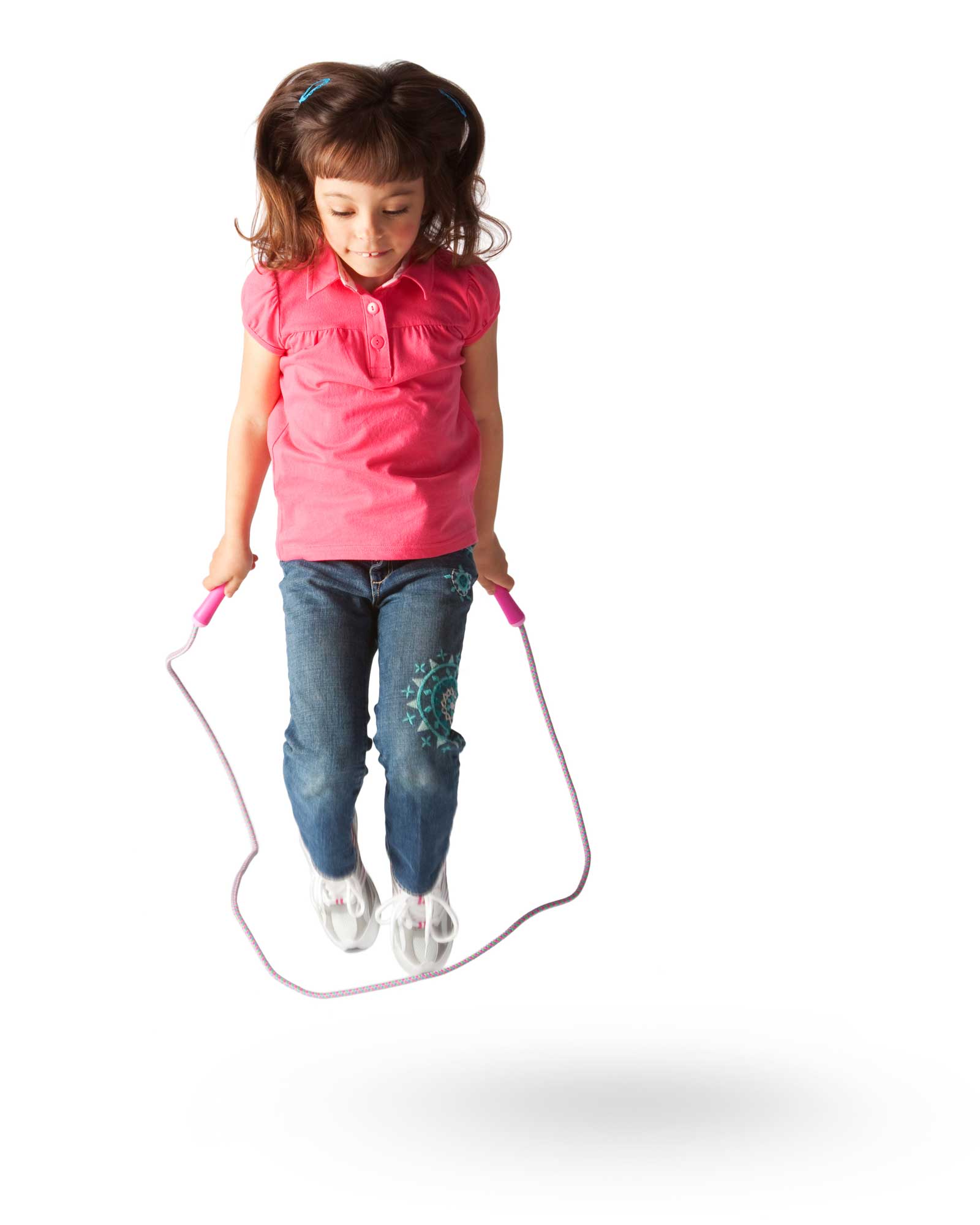 Little girl jumping rope.