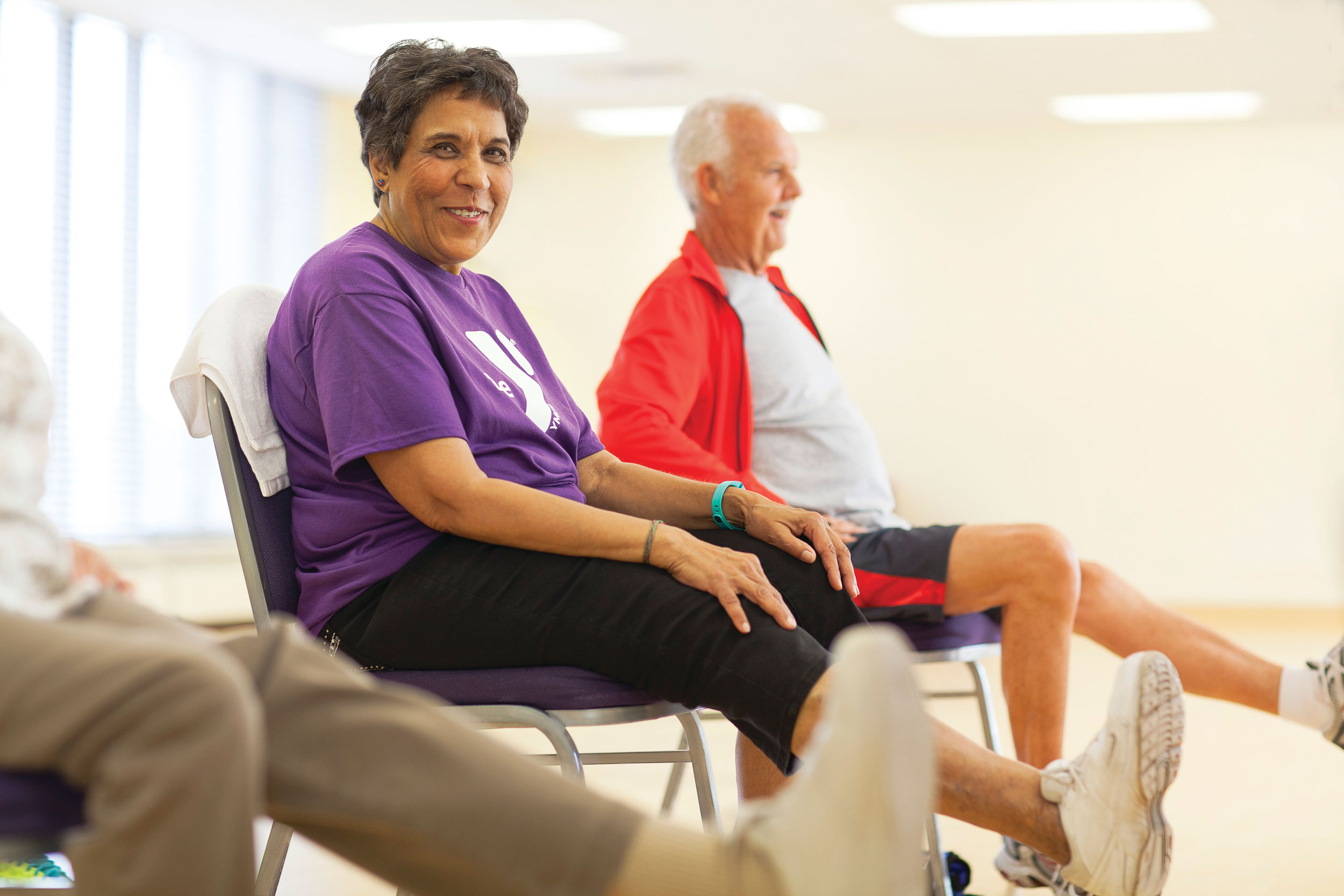 Seniors enjoying an exercise class.