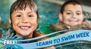 Learn To Swim 2 children in a pool smiling