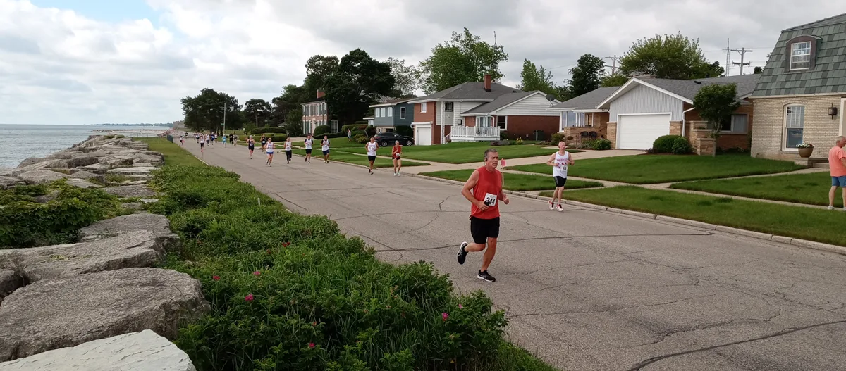 Group Of Runners By Lake Michigan Running The Ymca 5k. Group Of Runners By Lake Michigan Running The Ymca 5k.