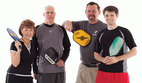 Pickleball Adult men & women playing basketball